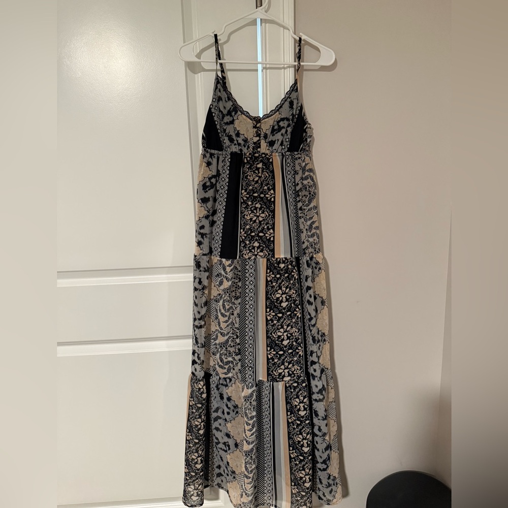 Elegant Black and Cream Patterned Dress